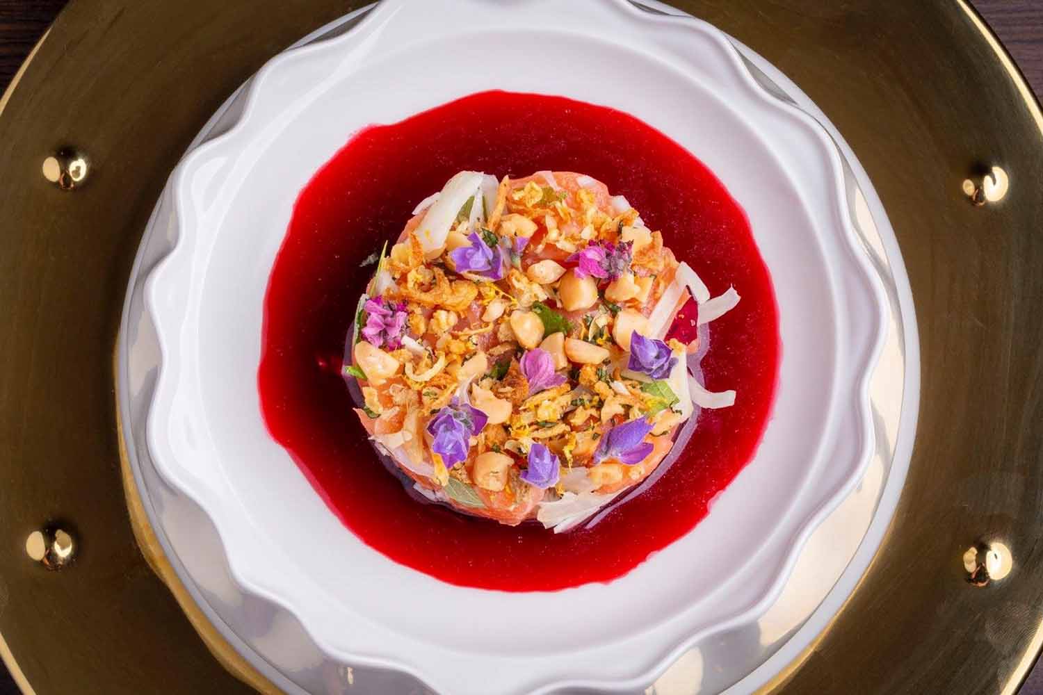 Lomi Lomi Salmon in a hibiscus broth